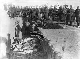 This infamous genocide occurred at Wounded Knee Creek, South Dakota, in 1890.